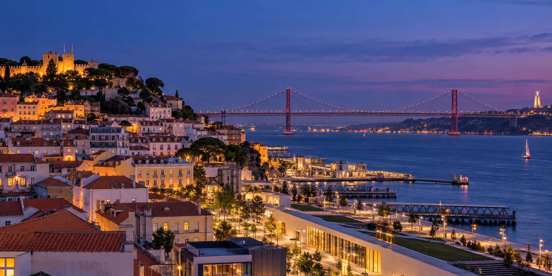 Lisbon rooftops and Tagus waterfront at blue hour